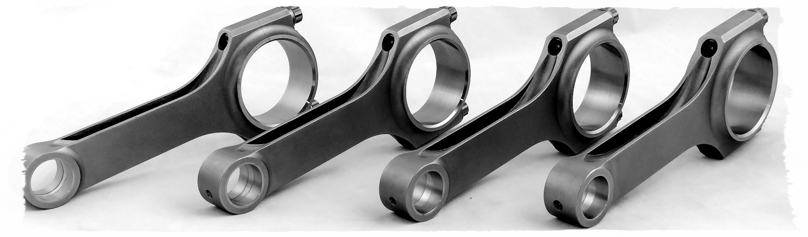 costruzione e vendita bielle speciali ricavate dal pieno per motori preparati elaborazione motori per vetture da competizione incremento prestazioni alta resistenza bulloni speciali bronzine trimetalliche alloggiamento elaborazione motori incremento potenza motori forgiati 