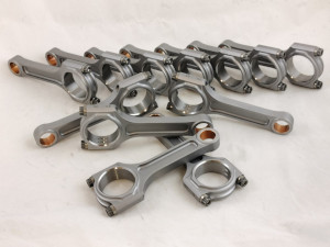 progettazione disegno e realizzazione costruzione bielle a disegno per restauro motori storiche e preparazione auto storiche da competizione incremento prestazioni bielle forgiate in acciaio ricavate dal pieno motore ferrari lamborghini maserati