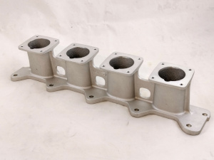 prearazione motori da competizione con collettore di aspirazione in alluminio per corpi farfallati singoli jenvey iniezione elettronica aumento prestazioni preparazione elettronica programmabile da competizione efi technology lavorazione condotti testata valvole maggiorate collettore di aspirazione renault clio rs f4r