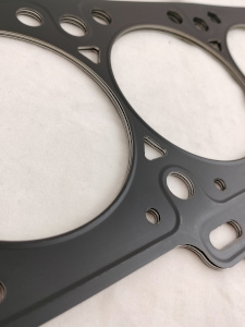 guarizione multistrato speciale in acciaio inox con bordatura incremento prestazioni affidabilità preparazione motore bmw m3 gruppo A aumento rapporto di compressione incremento cavalli regime di rotazione guarnizione testata speciale motore s14 2300cc 16 valvole