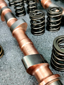 utilizzo e montaggio molle valvole speciali rinforzate alleggerimento punterie meccaniche preparazione motore racing fiat 128 punto gt uno turbo conversion motore ad iniezione elettrnica aumento regime di rotazione maggiorazione cavalli potenza coppia motore fasatura alberi a camme speciali da competizione