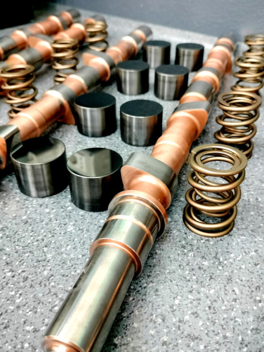 kit per elaborazione motori alfa romeo bialbero giulia alfetta turbo delta 75 turbo america evoluzione molle valvole speciali rinforzate alzata maggiore valvole incremento regime di rotazione punterie maccaniche leggere registri valvole a cappuccio regolazione gioco valvole fasatura camme speciali calcolo pacco molla carico molla precarico montaggio piattelli valvole e semiconi